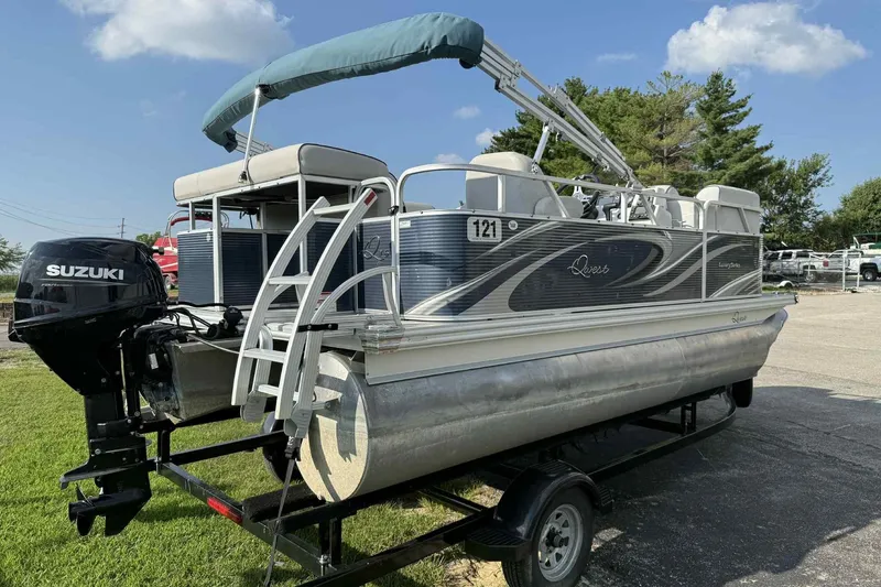 Slide: The Image of 2019 Qwest 816 Luxury Series pontoon boat with Suzuki outboard motor on trailer. - 6