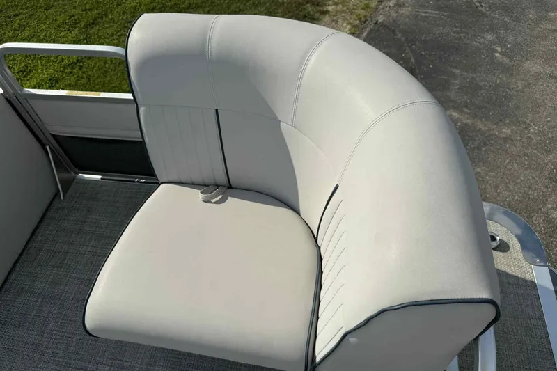 Slide: The Image of Luxurious seating on 2019 Qwest 816 Luxury Series boat, featuring elegant upholstery and design. - 9