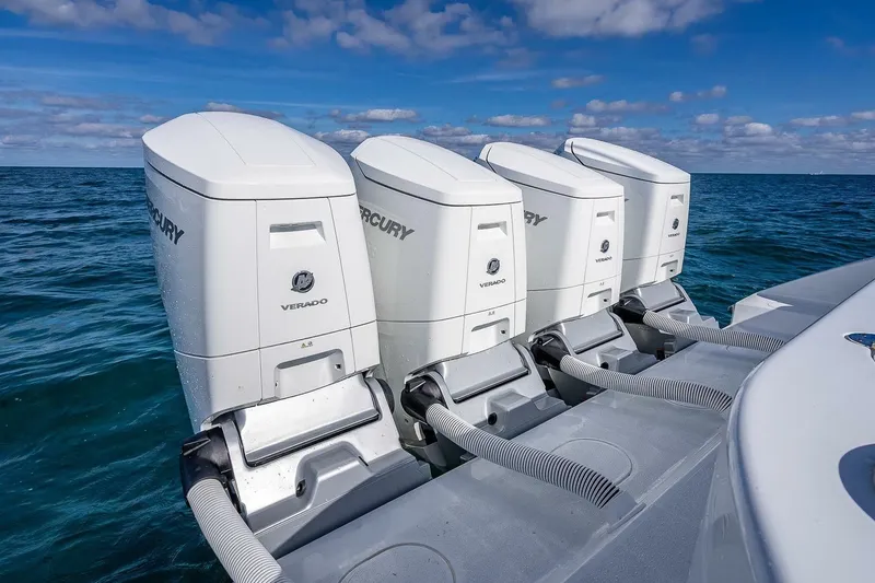 Slide: The Image of 2024 Yellowfin 54 Offshore boat with four Mercury Verado outboard engines on open water. - 17