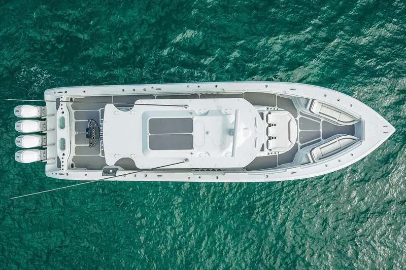 Slide: The Image of Aerial view of 2024 Yellowfin 54 Offshore boat on turquoise water. - 8