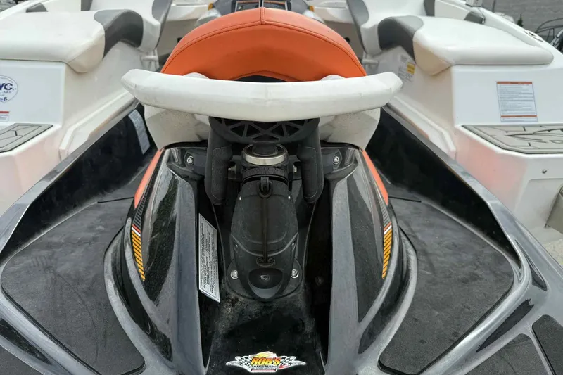 Slide: The Image of 2024 Galar Boats Typhoon with Seadoo GTI SE 155, close-up of seating and controls. - 11