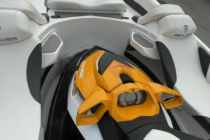 Slide: The Image of 2024 Galar Boats Typhoon with Seadoo GTI SE 155, featuring sleek design and seating. - 14