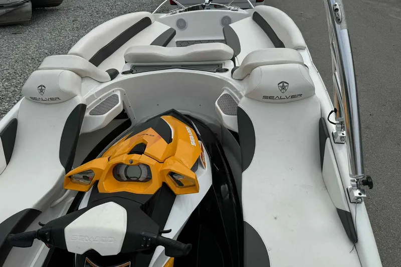 Slide: The Image of 2024 Galar Boats Typhoon with Seadoo GTI SE 155, featuring sleek white and black design. - 15