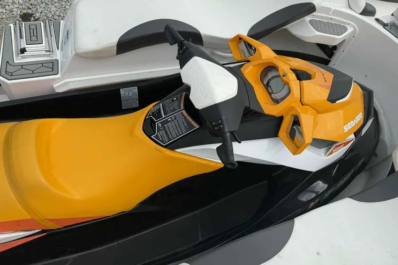 Slide: The Image of 2024 Galar Boats Typhoon with Seadoo GTI SE 155, featuring vibrant yellow and black design. - 16