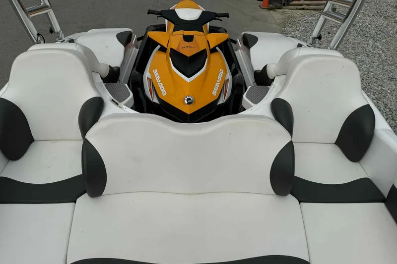 Slide: The Image of 2024 Galar Boats Typhoon with Seadoo GTI SE 155, featuring white and black seating. - 18