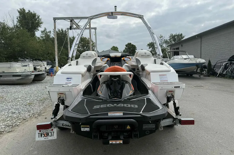 Slide: The Image of 2024 Galar Boats Typhoon with Seadoo GTI SE 155, parked on a trailer. - 5