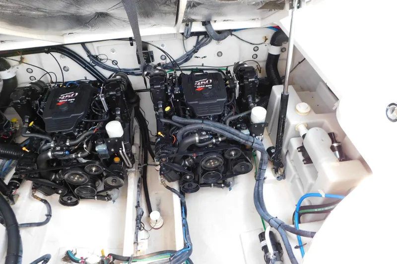Slide: The Image of Engine compartment of a 2005 Sea Ray 320 Sundancer with twin MerCruiser engines. - 118