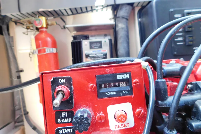 Slide: The Image of Control panel of a 2005 Sea Ray 320 Sundancer boat engine room. - 123