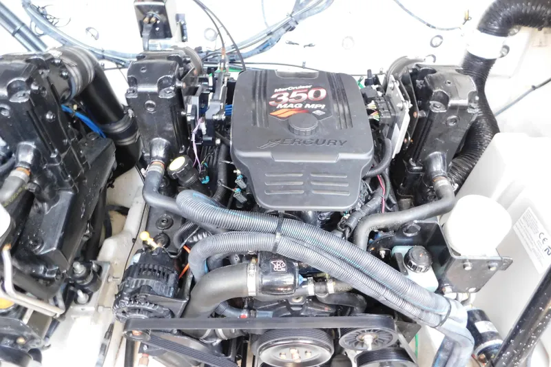 Slide: The Image of Engine of a 2005 Sea Ray 320 Sundancer with MerCruiser 350 MAG MPI. - 126