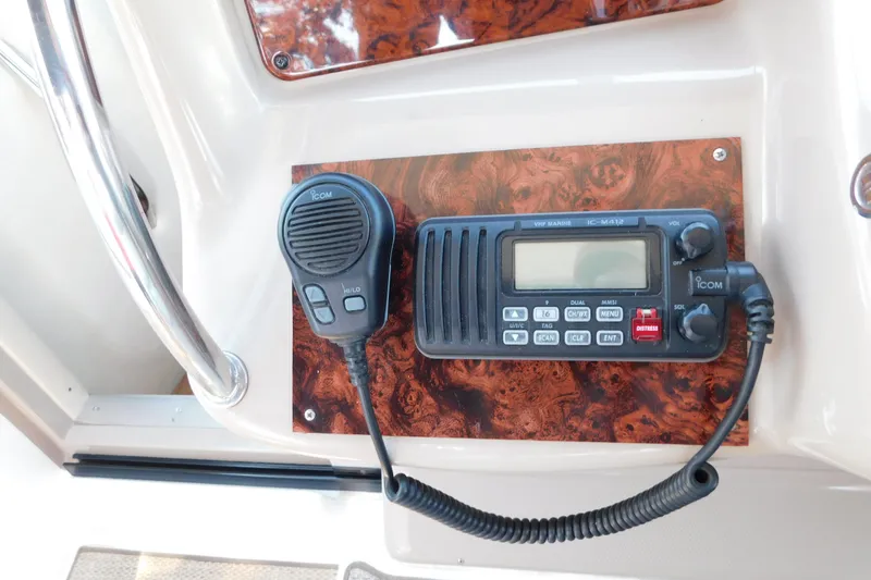Slide: The Image of VHF marine radio on 2005 Sea Ray 320 Sundancer boat dashboard. - 40