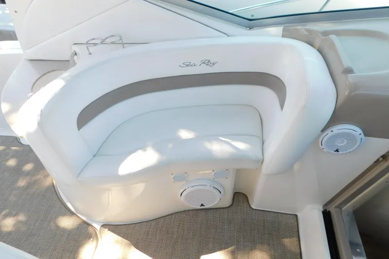 Slide: The Image of White seating area on 2005 Sea Ray 320 Sundancer boat with integrated speakers. - 41