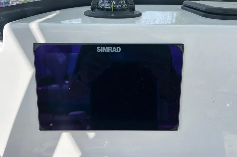 Slide: The Image of Simrad display on 2026 Sea Pro 222 Center Console boat dashboard. - 10