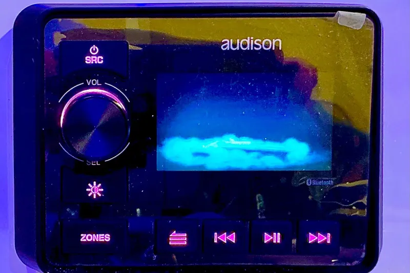 Slide: The Image of Audison audio system in 2026 Sea Pro 222 Center Console boat, featuring illuminated controls. - 14
