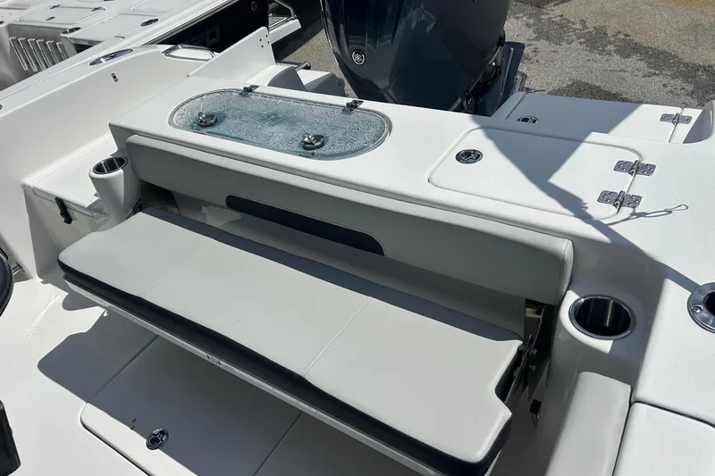 Slide: The Image of 2026 Sea Pro 222 Center Console boat interior with seating and storage compartments. - 32