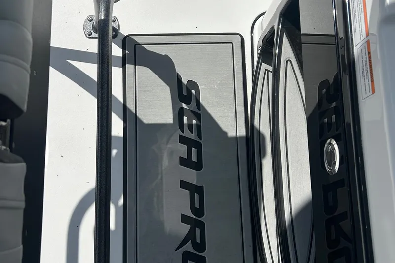 Slide: The Image of 2026 Sea Pro 222 Center Console boat deck with logo and seating. - 35