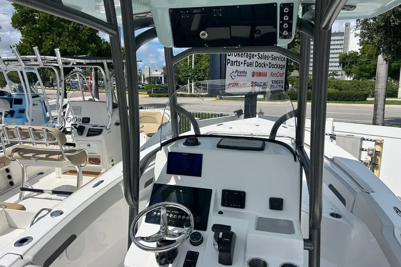 Slide: The Image of 2026 Sea Pro 222 Center Console boat interior with modern dashboard and seating. - 38