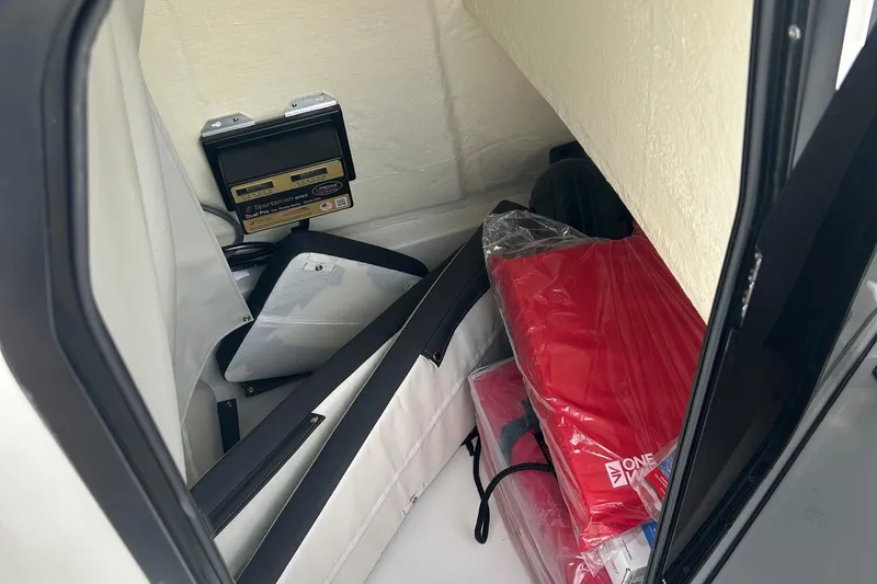 Slide: The Image of Storage compartment in 2026 Sea Pro 222 Center Console boat with equipment and supplies. - 39