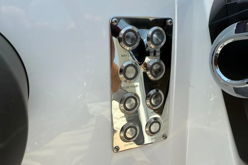 Slide: The Image of Control panel on 2025 Highfield Sport 560 boat with labeled buttons. - 13