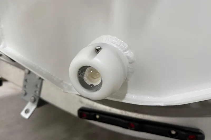 Slide: The Image of Close-up of a 2025 Highfield Sport 560 boat's white hull detail. - 30