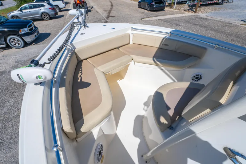 Slide: The Image of 2016 Cobia 201 Center Console boat with spacious seating and modern design. - 12