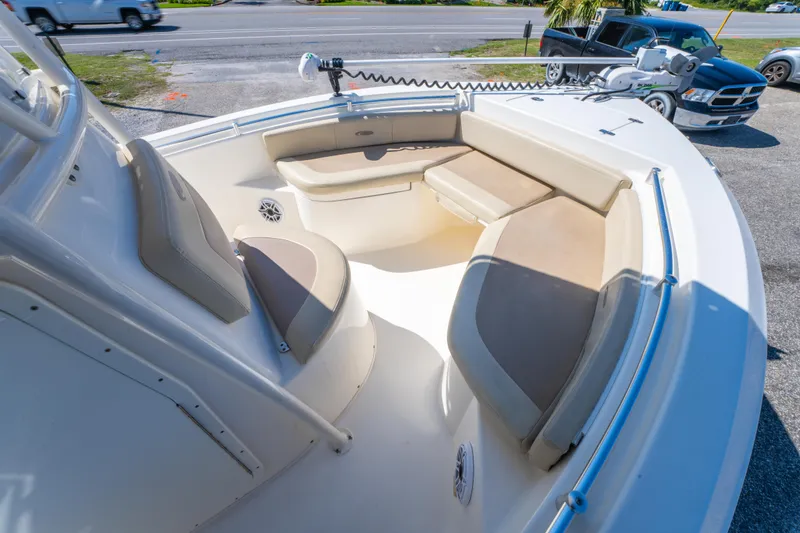 Slide: The Image of 2016 Cobia 201 Center Console boat with spacious seating and modern design. - 13