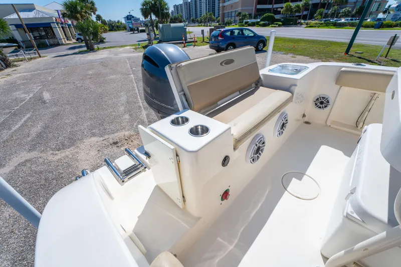 Slide: The Image of 2016 Cobia 201 Center Console boat interior with seating and speakers. - 9