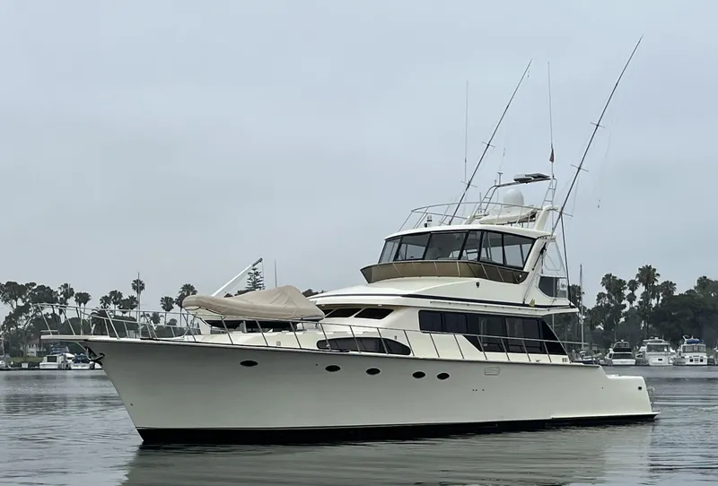 Slide: The Image of 1999 Mikelson Long-Range Luxury Sportfisher yacht on calm water, overcast sky. - 2