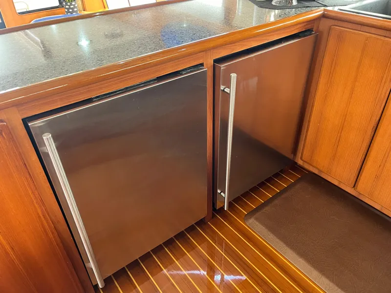 Slide: The Image of Stainless steel appliances in 1999 Mikelson Long-Range Luxury Sportfisher yacht kitchen. - 29