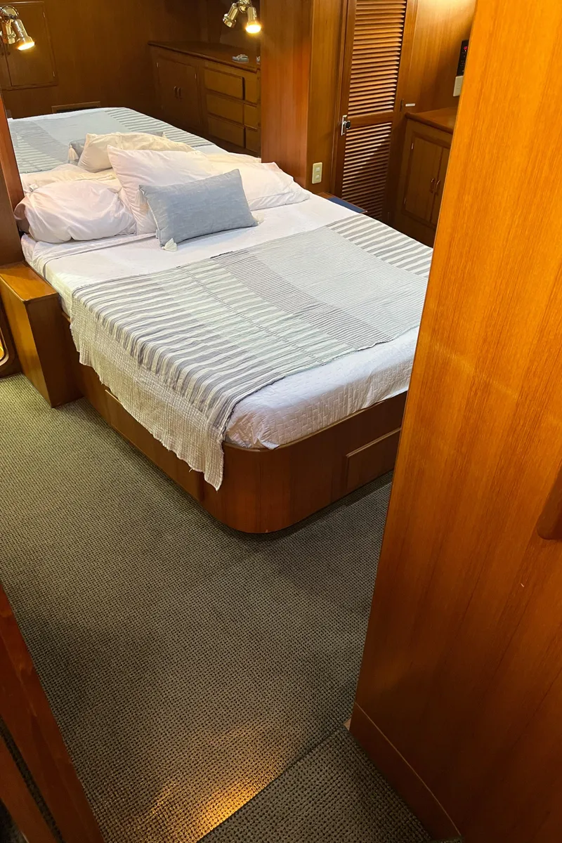 Slide: The Image of Luxurious bedroom interior of 1999 Mikelson Long-Range Luxury Sportfisher yacht. - 38