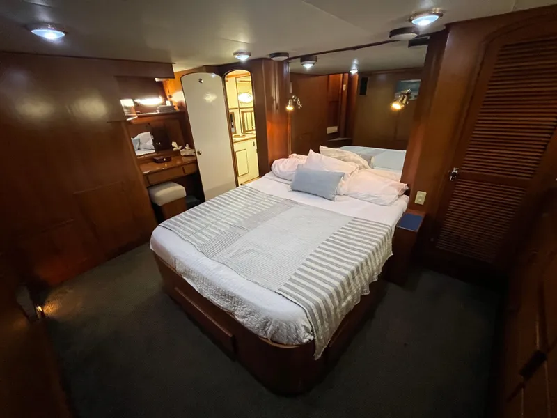 Slide: The Image of Luxurious cabin interior of a 1999 Mikelson Long-Range Luxury Sportfisher yacht. - 40