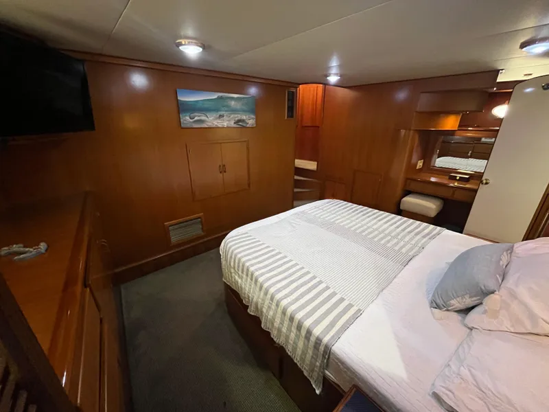 Slide: The Image of Luxurious cabin interior of a 1999 Mikelson Long-Range Luxury Sportfisher yacht. - 42