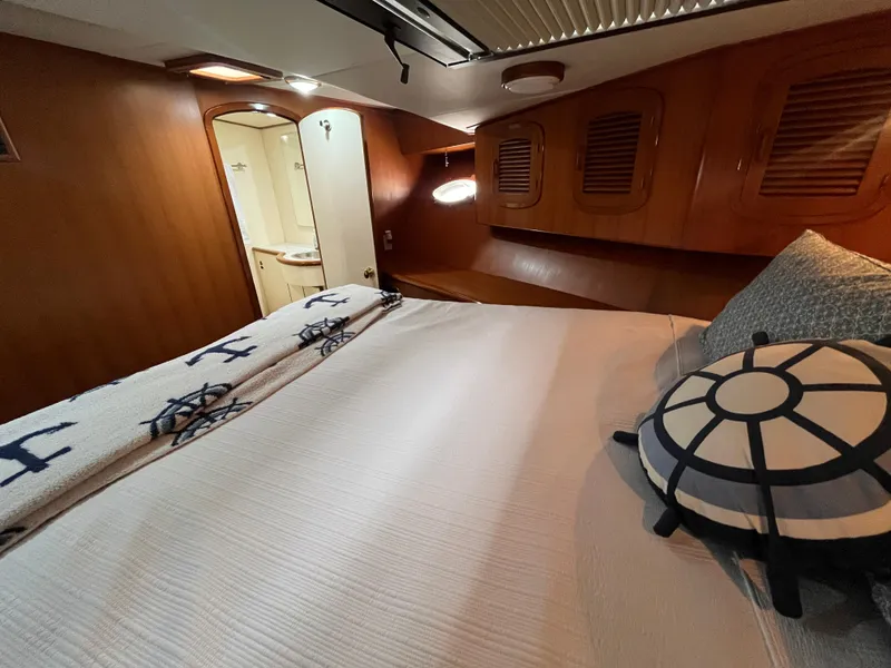 Slide: The Image of Luxurious cabin interior of a 1999 Mikelson Long-Range Luxury Sportfisher yacht. - 48