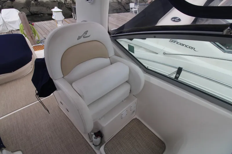 Slide: The Image of Captain's seat on 2008 Sea Ray 340 Sundancer yacht, docked at marina. - 18
