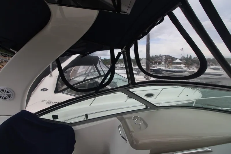 Slide: The Image of Interior view of a 2008 Sea Ray 340 Sundancer yacht at a marina. - 8