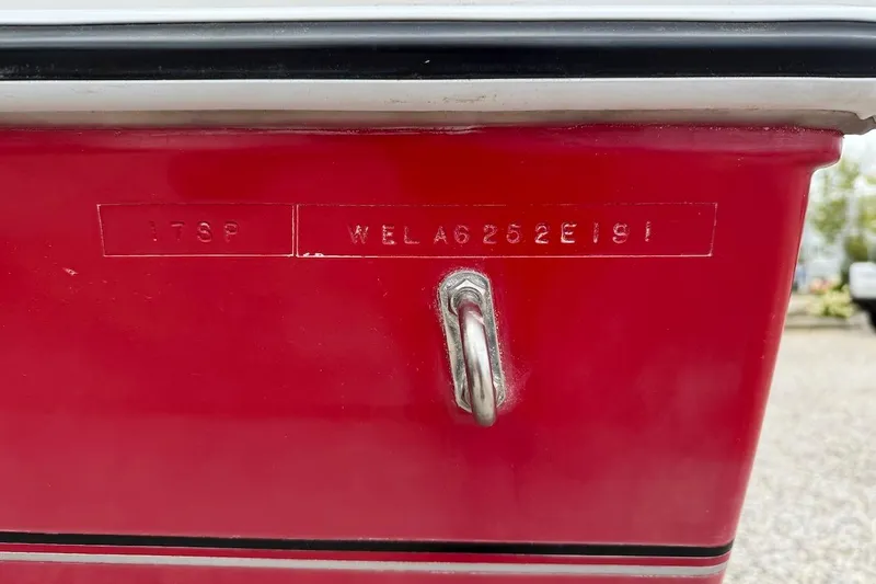Slide: The Image of Red Wellcraft 170 Sport boat hull with serial number, 1991 model. - 13