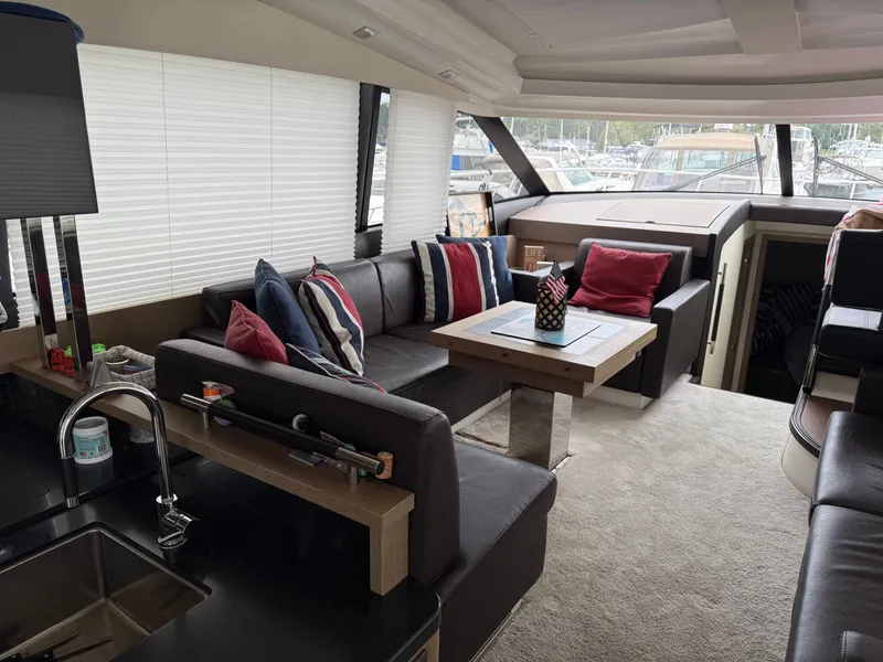 Slide: The Image of Luxurious interior of 2018 Prestige 500 S yacht with modern seating and decor. - 3