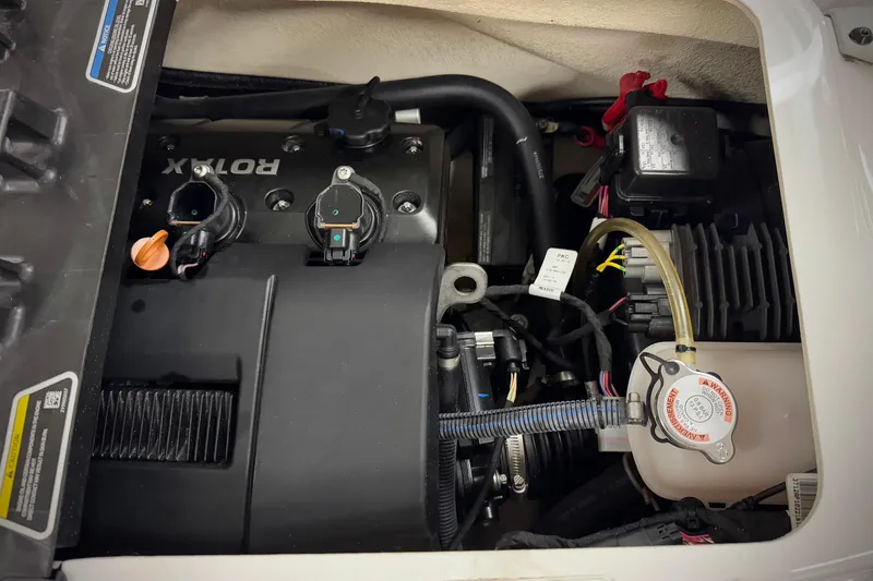 Slide: The Image of Engine compartment of a 2019 Sea-Doo Fish Pro 155, featuring Rotax components. - 10