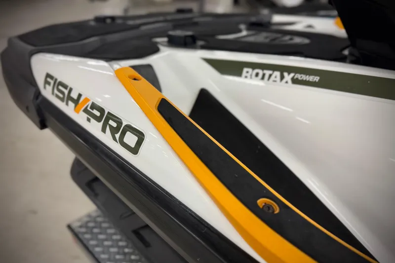 Slide: The Image of 2019 Sea-Doo Fish Pro 155 with Rotax power, close-up of branding and design elements. - 8