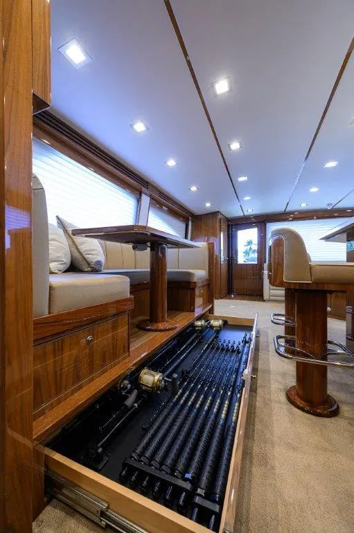 Slide: The Image of Luxurious 2020 Viking 72 Convertible yacht interior with hidden fishing rod storage. - 15