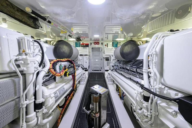 Slide: The Image of Engine room of 2020 Viking 72 Convertible yacht, showcasing advanced machinery and equipment. - 47