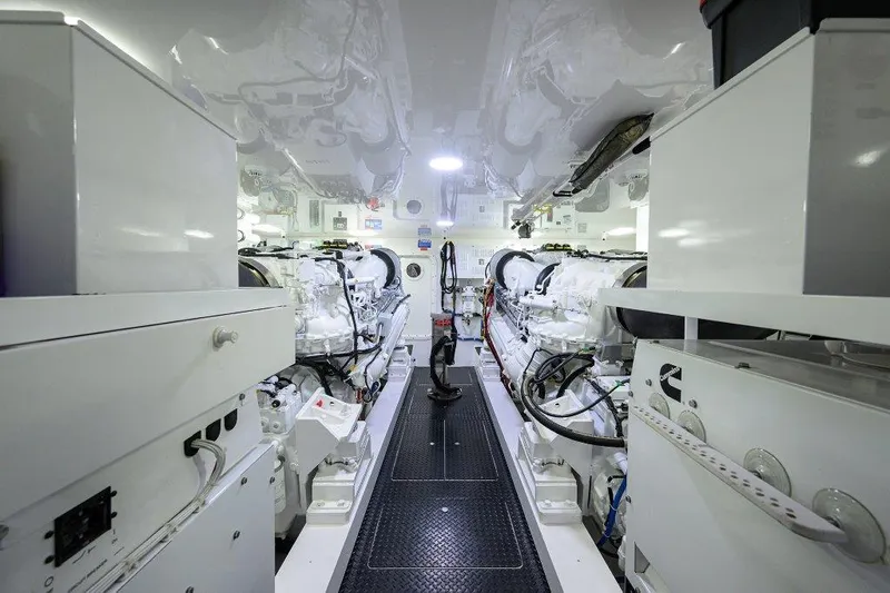 Slide: The Image of Engine room of 2020 Viking 72 Convertible yacht, showcasing advanced machinery and equipment. - 48