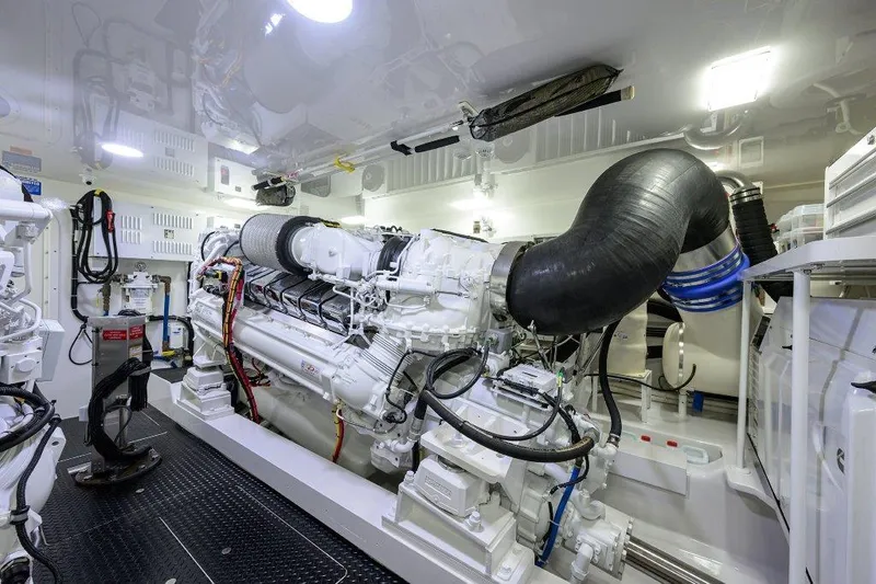 Slide: The Image of Engine room of 2020 Viking 72 Convertible yacht, showcasing advanced machinery and equipment. - 49