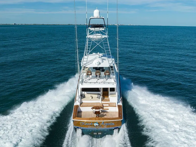 Slide: The Image of 2020 Viking 72 Convertible yacht cruising on open sea, aerial view. - 6