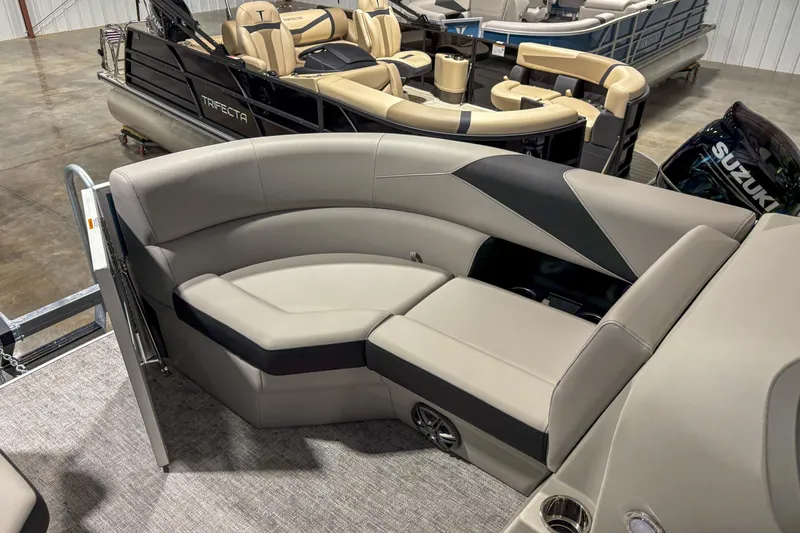 Slide: The Image of 2025 Trifecta 20RF LE pontoon boat with luxurious seating and modern design. - 11
