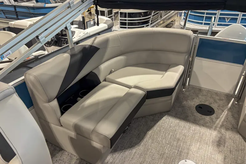 Slide: The Image of 2025 Trifecta 20RF LE pontoon boat interior with plush seating and modern design. - 5