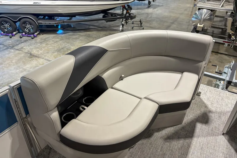Slide: The Image of Luxurious seating on 2025 Trifecta 20RF LE pontoon boat with cup holders and modern design. - 7
