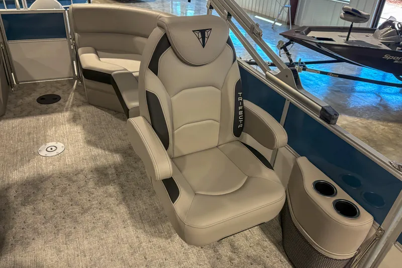 Slide: The Image of 2025 Trifecta 20RF LE boat interior with luxurious seating and cup holders. - 9