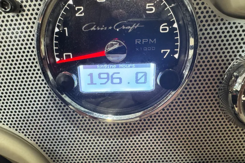 Slide: The Image of Chris-Craft Launch 23 2021 engine hours gauge showing 196 hours. - 12