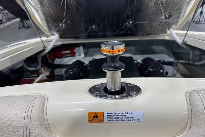 Slide: The Image of 2021 Chris-Craft Launch 23 boat interior with ski tow fitting and warning label. - 19