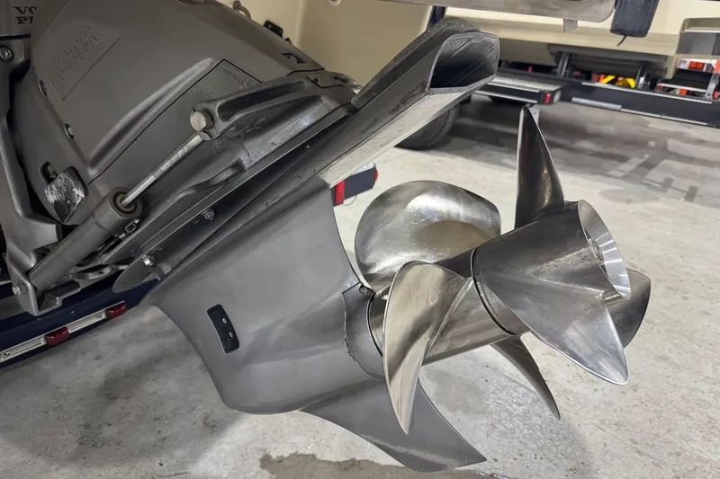 Slide: The Image of Close-up of a 2021 Chris-Craft Launch 23 boat propeller and outdrive. - 4